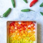 frozen peppers on a baking sheet (how to freeze peppers).
