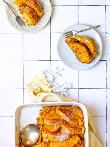 pumpkin french toast bake in a casserole dish and on plates.