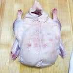 duck with holes poked in the skin from a paring knife.