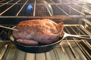 duck roasting in the oven.