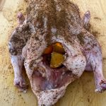 Duck with orange wedges in the cavity.