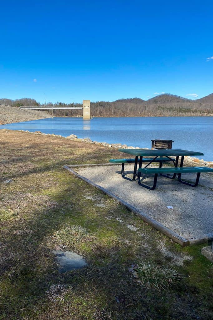 Picnic area at Stony Cove with Cave Run Lake dam in background.