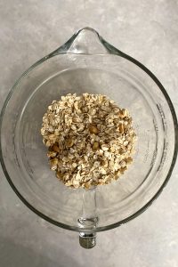 Add Oats and Peanuts to Mixing Bowl.