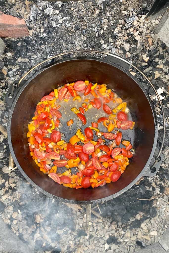 Add vodka and tomatoes to dutch oven.