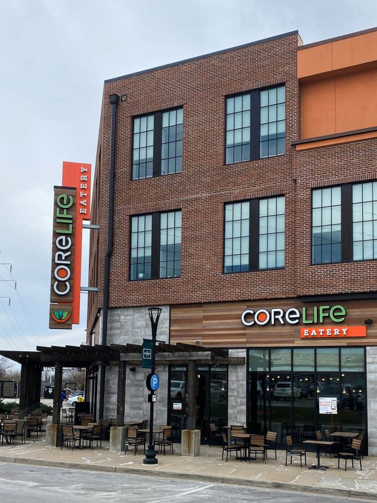 Exterior of CoreLife Eatery with outdoor dining area.