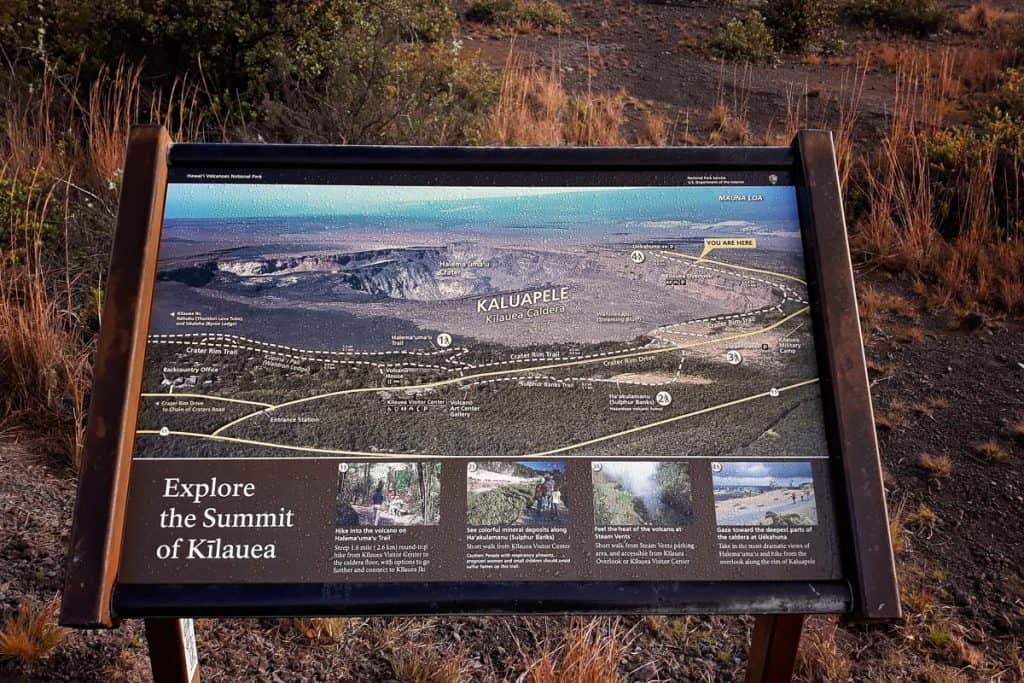 Sign reading "Explore the Summit of Kilauea" with map and photos.