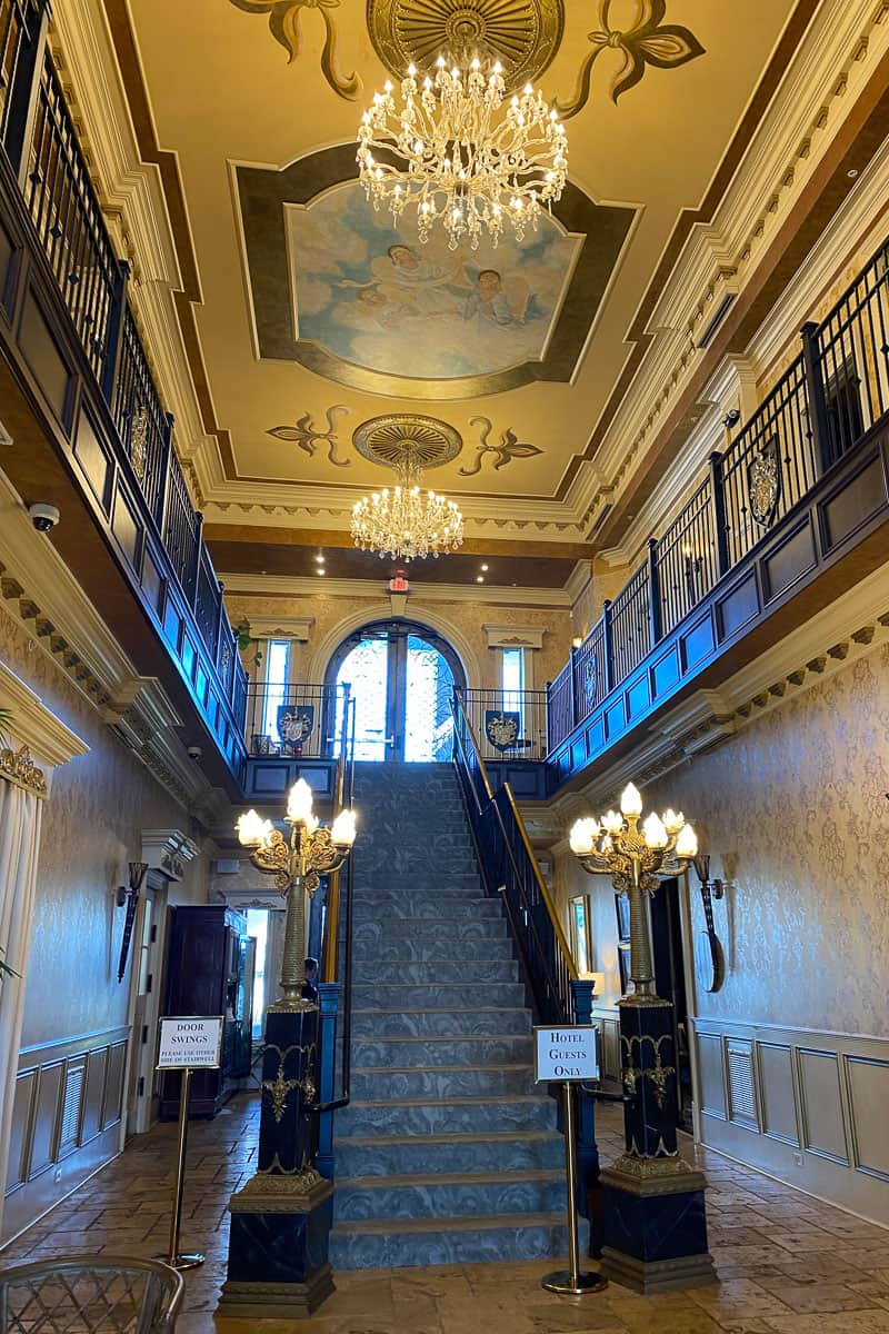Staircase and chandeliers at Kentucky Castle.