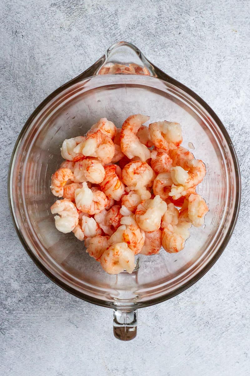 thawed langostino tails in a bowl.