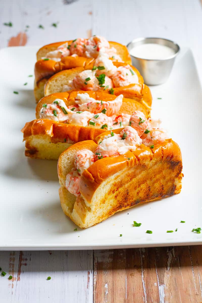 langostino lobster rolls on a serving tray.
