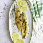 pan-seared hake on platter.