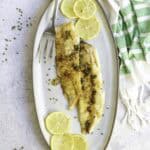 pan-seared hake on platter.