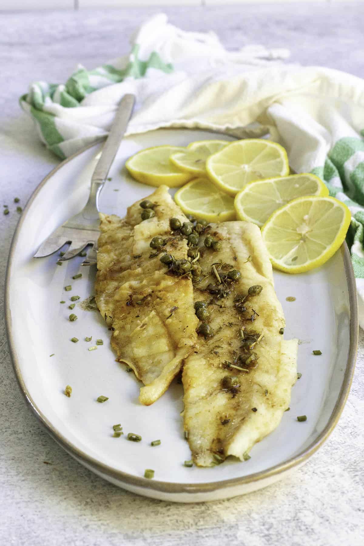 pan-seared hake on platter.