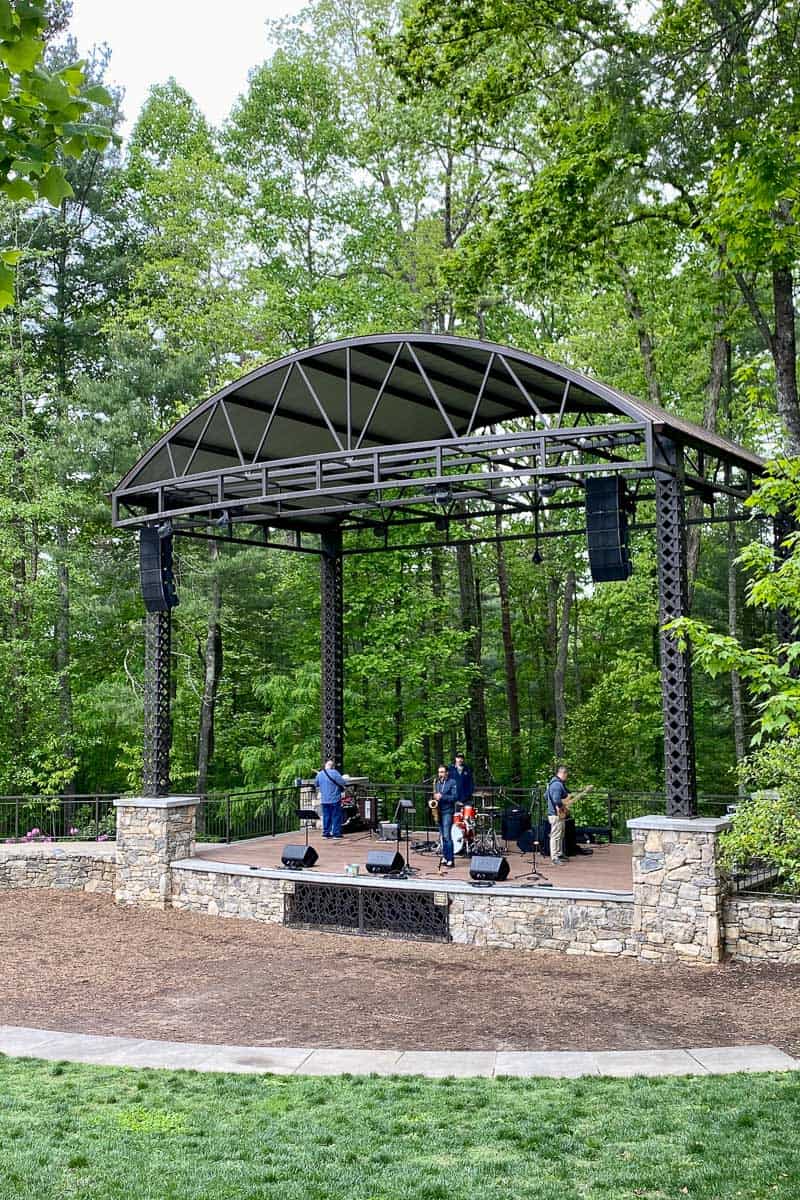 outdoor stage with musicians at sierra nevada in asheville.