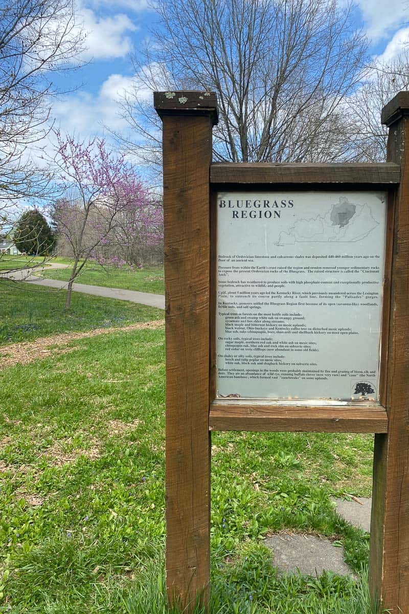sign for bluegrass region at university of kentucky arboretum.