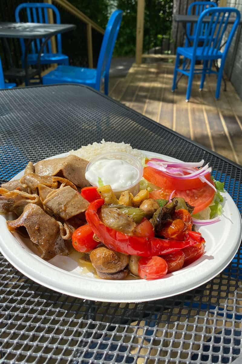 gyro meat, roasted vegetables and rice.