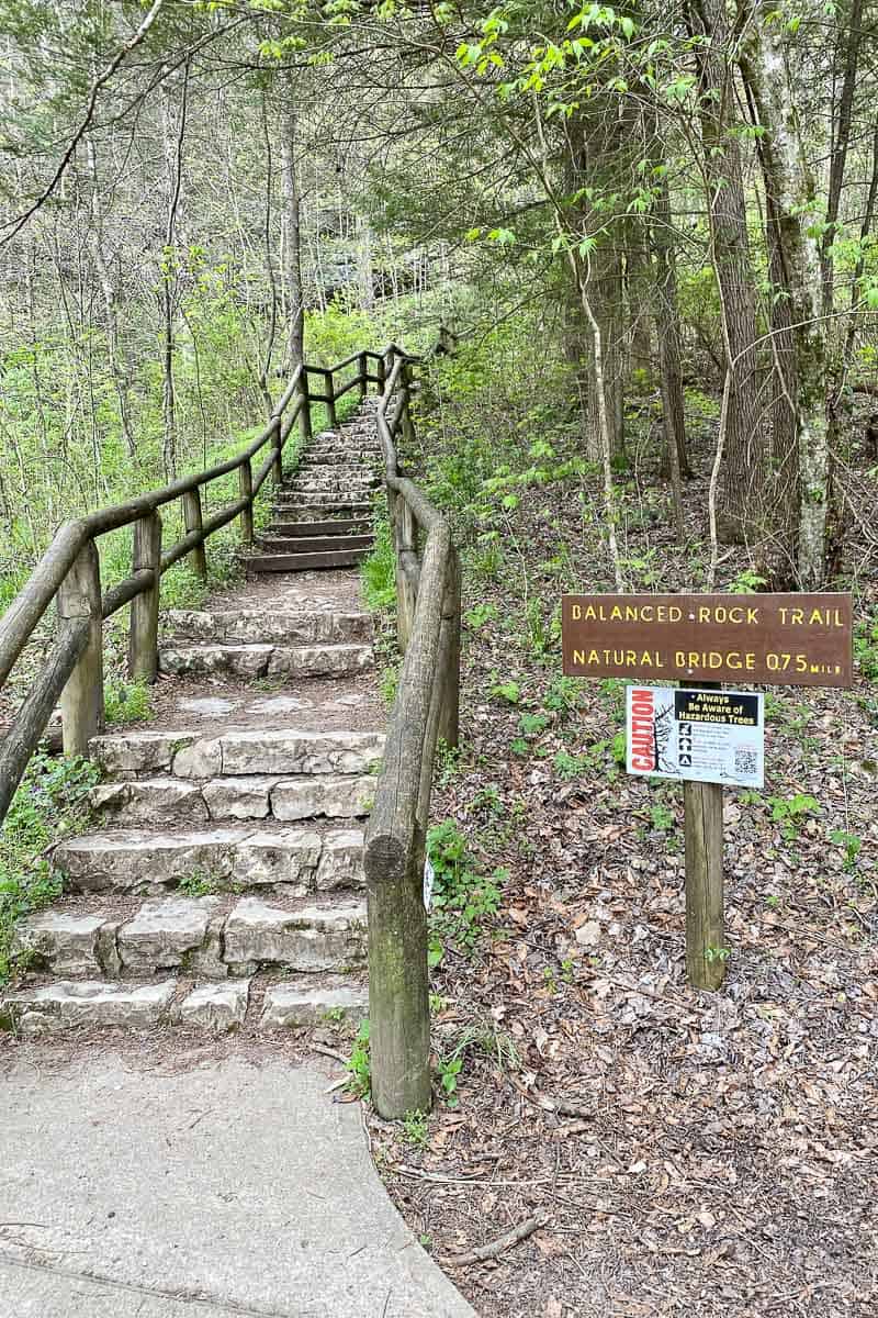Sign for Balanced Rock Trail next to stone staircase.