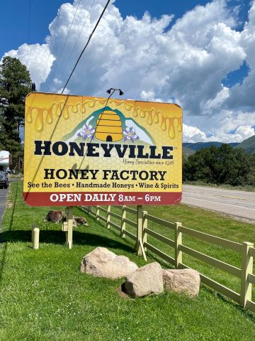 Roadside sign for Honeyville.