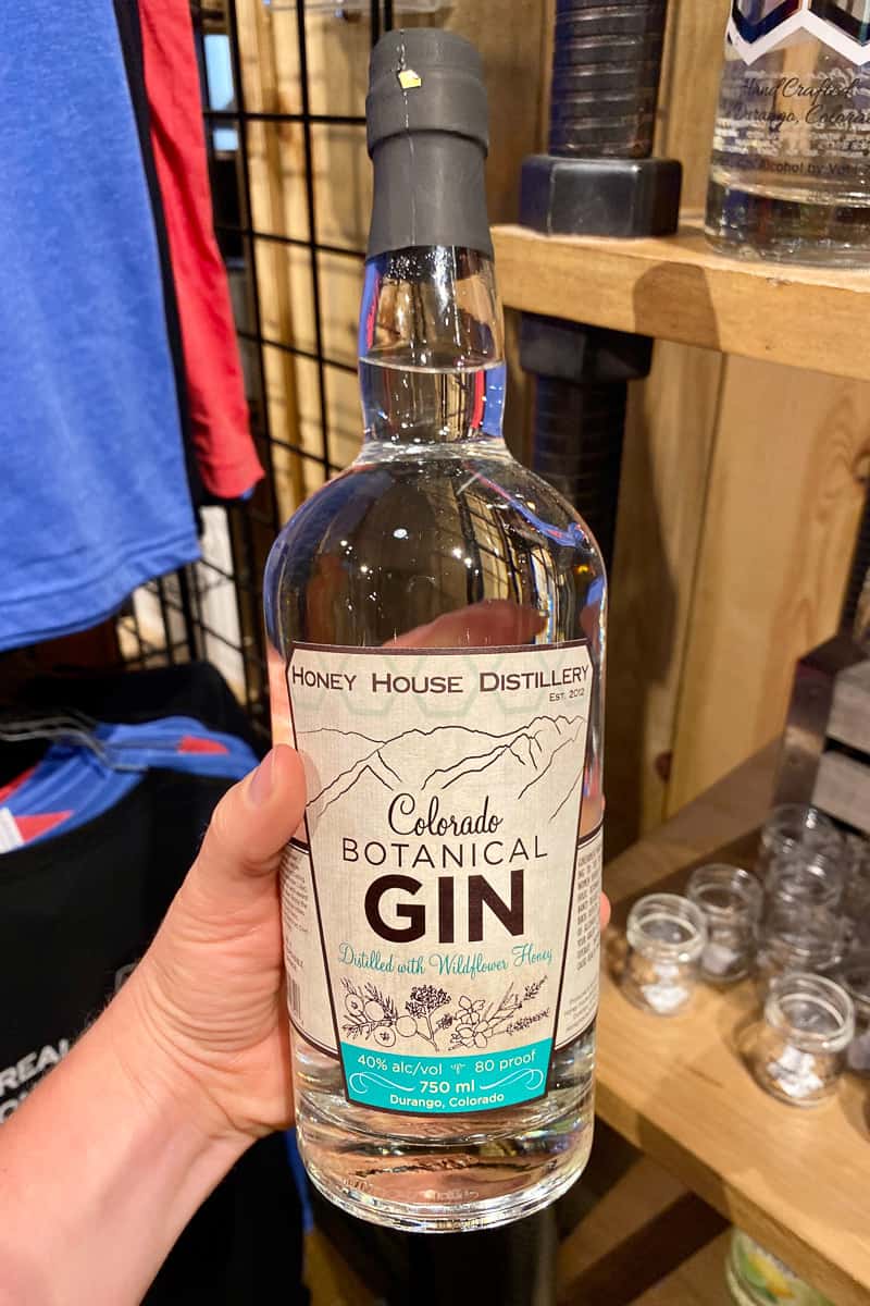 Bottle of Colorado botanical gin distilled with wildflower honey.