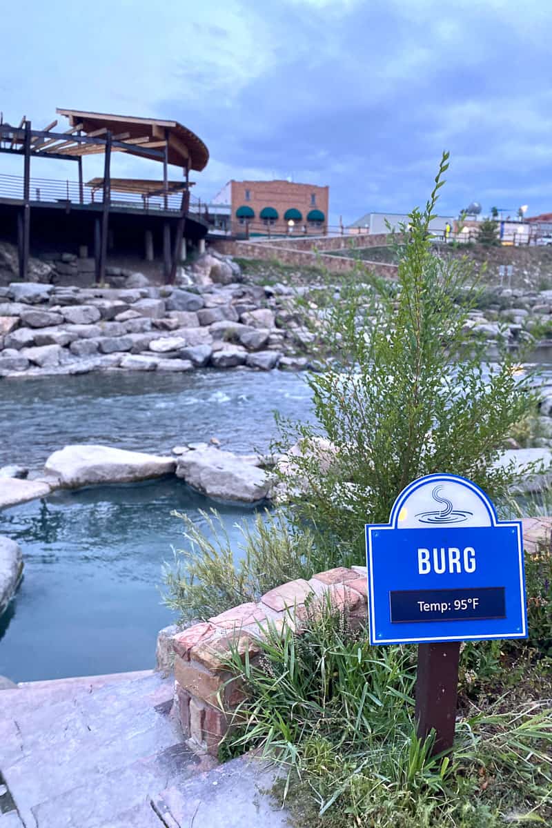 Sign saying "Burg" and listing water temperature of hot springs.