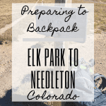 Text reading "Preparing to Backpack Elk Park to Needleton, Colorado" overlaid on photo of trail stretching towards mountains.