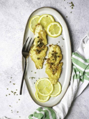 pan-seared orange roughy on a plate.