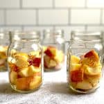 Diced apples in mason jars.