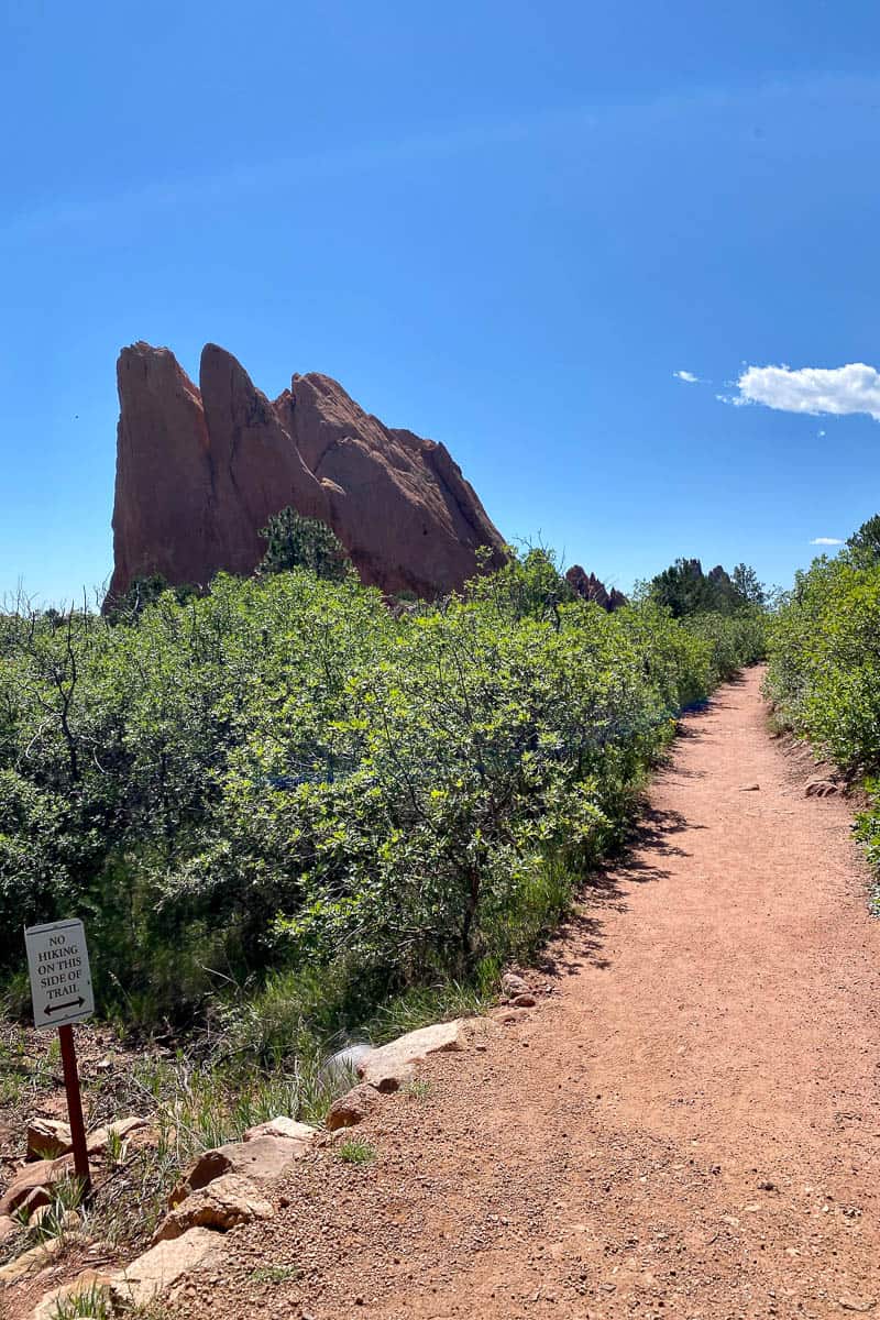 Trail leading past large red rock formation in Garden of the Gods.