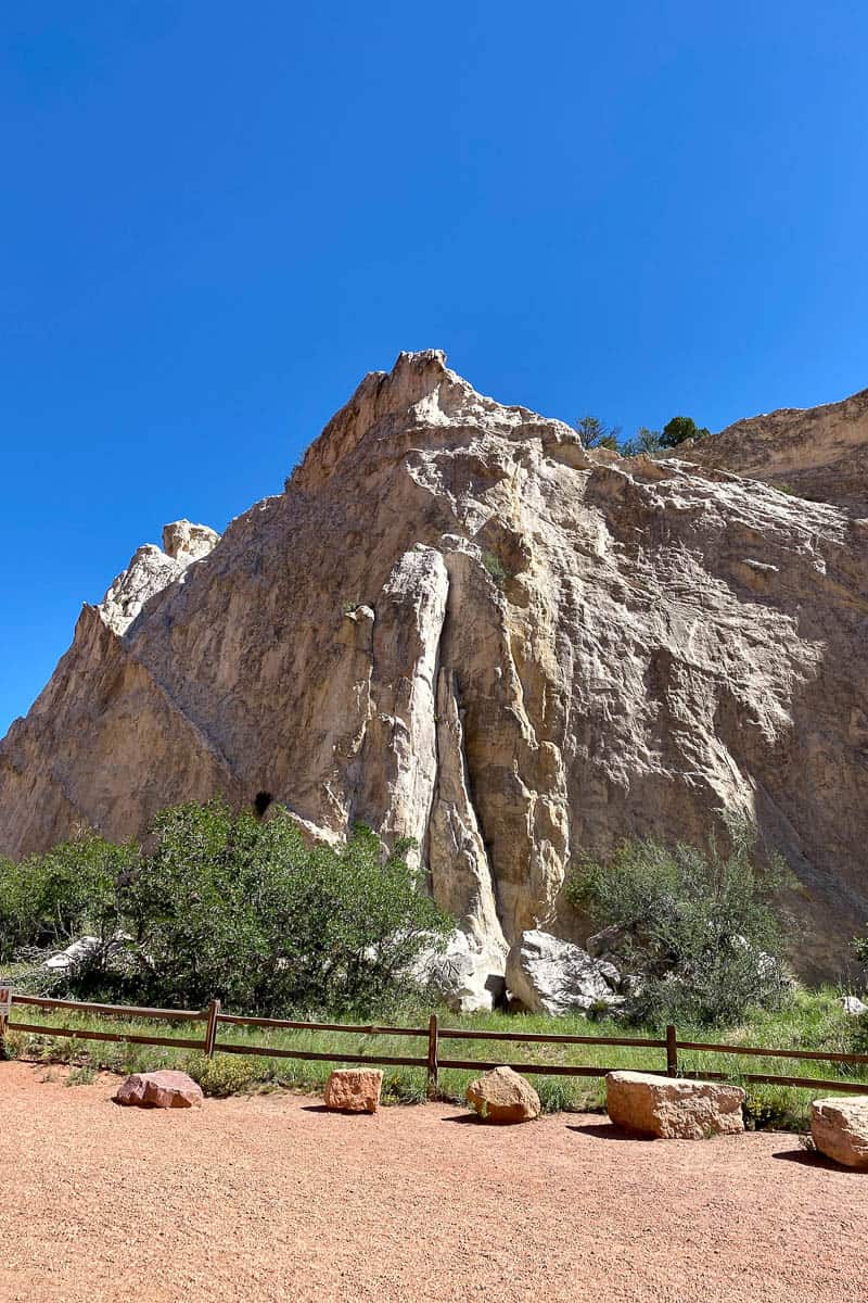 Mountainous rock formation next to dirt path in Garden of the Gods.