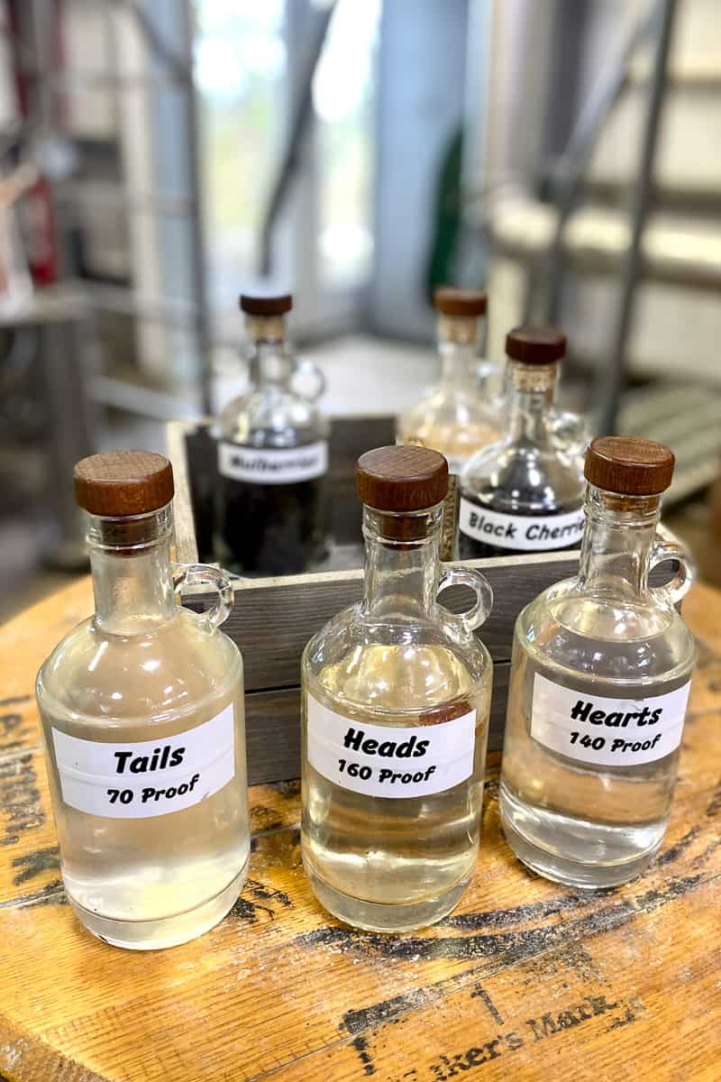 Small bottles of 70 proof, 140 proof, and 160 proof distillate.