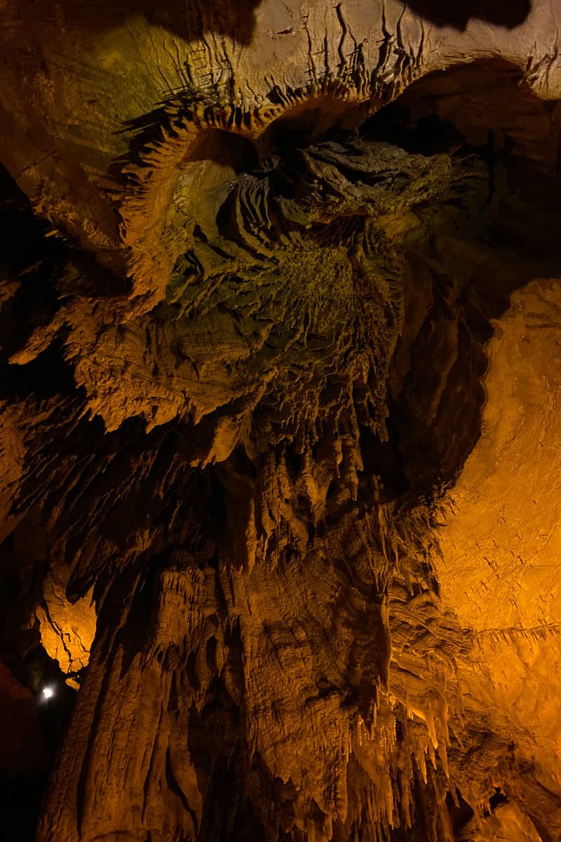 Stalactites in ceiling of cave.