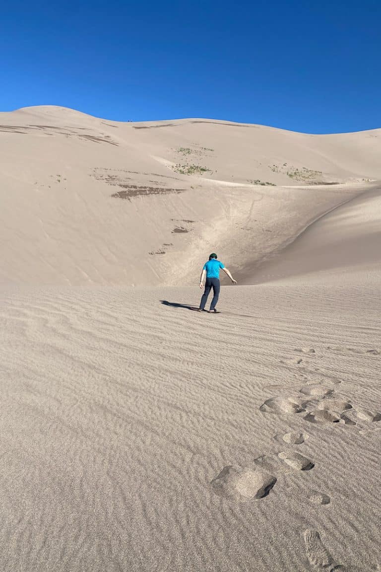 Sandboarding in Colorado (Great Sand Dunes) Champagne Tastes®