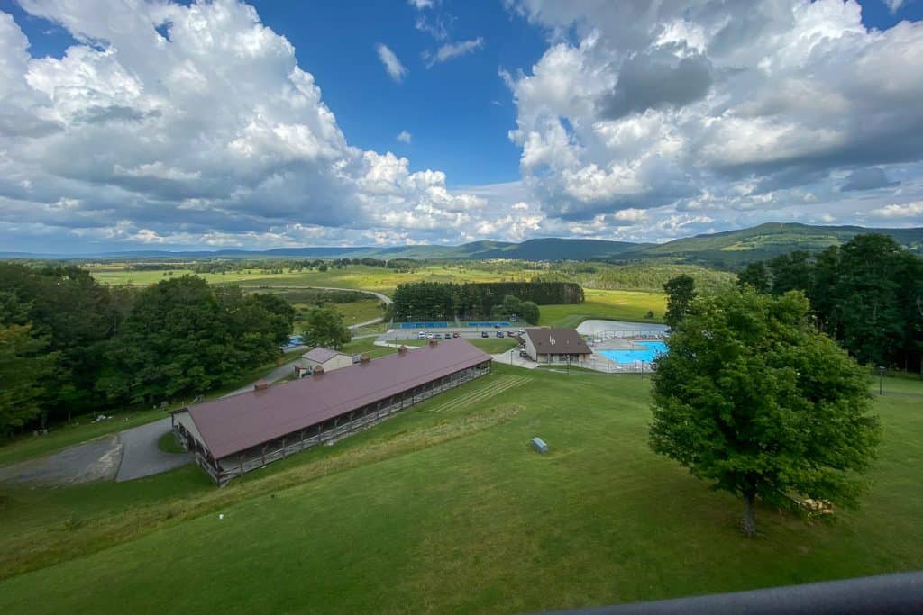 Swimming pool and pavilion viewed from above.