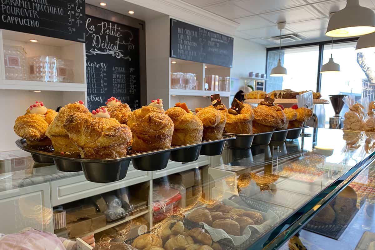 Cruffin pastries displayed on counter.