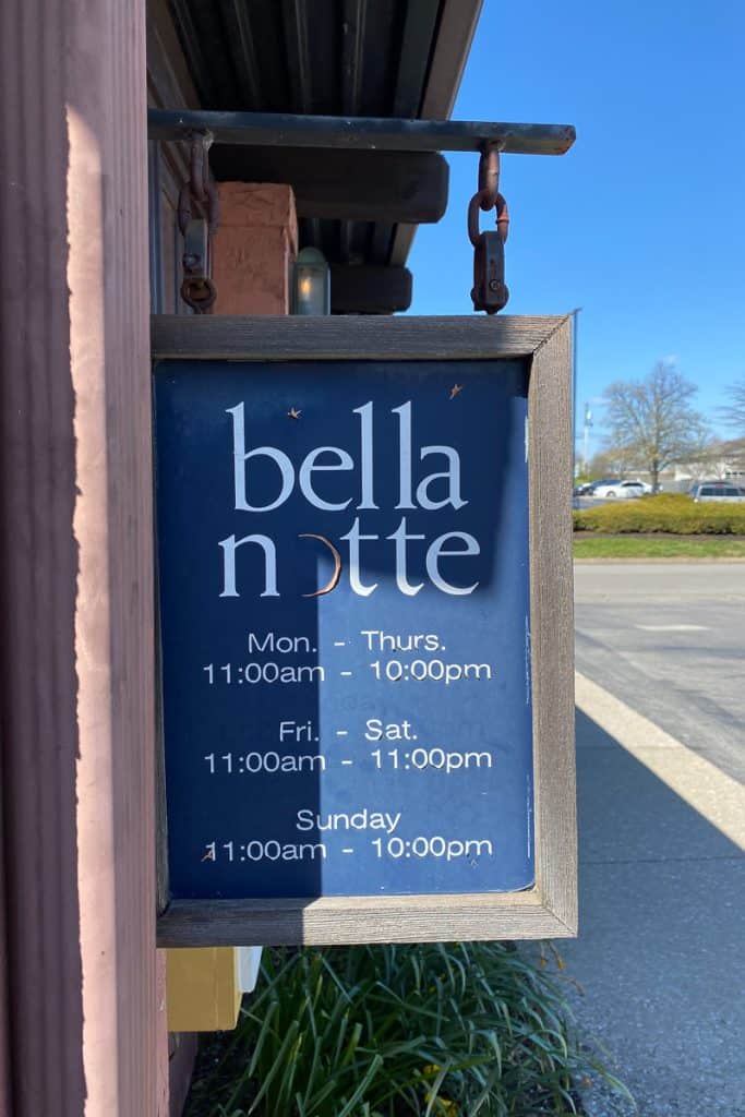 Sign for Bella Notte hours of operation.