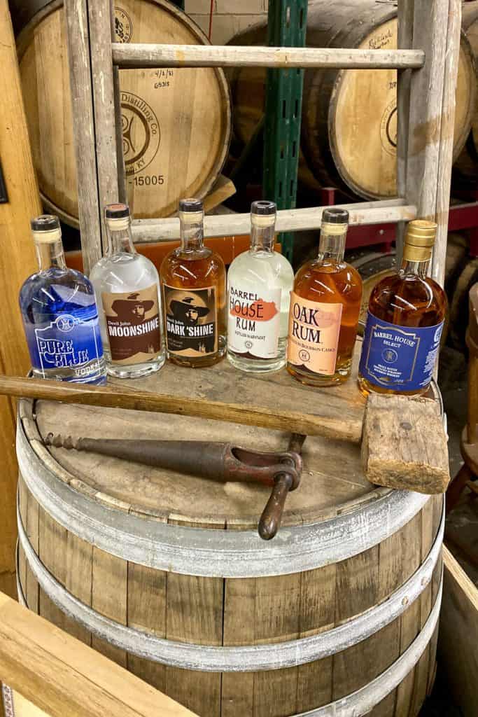 Barrel House moonshine, vodka, rum and whiskey in bottles for display.