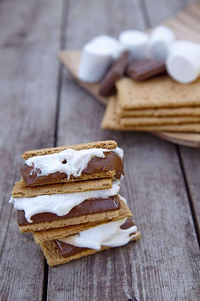 Three campfire smores stacked on top of each other.