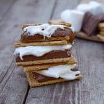Three campfire smores stacked on top of each other.