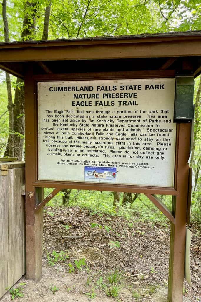 Sign with Eagle Falls trail information.