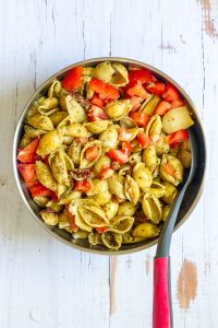 Pasta with artichoke hearts, tomatoes and capers added.