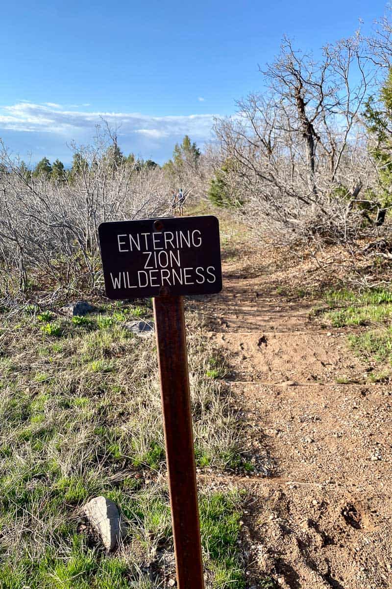 Sign that says, "Entering Zion Wilderness," an area with no crowds in Zion National Park.