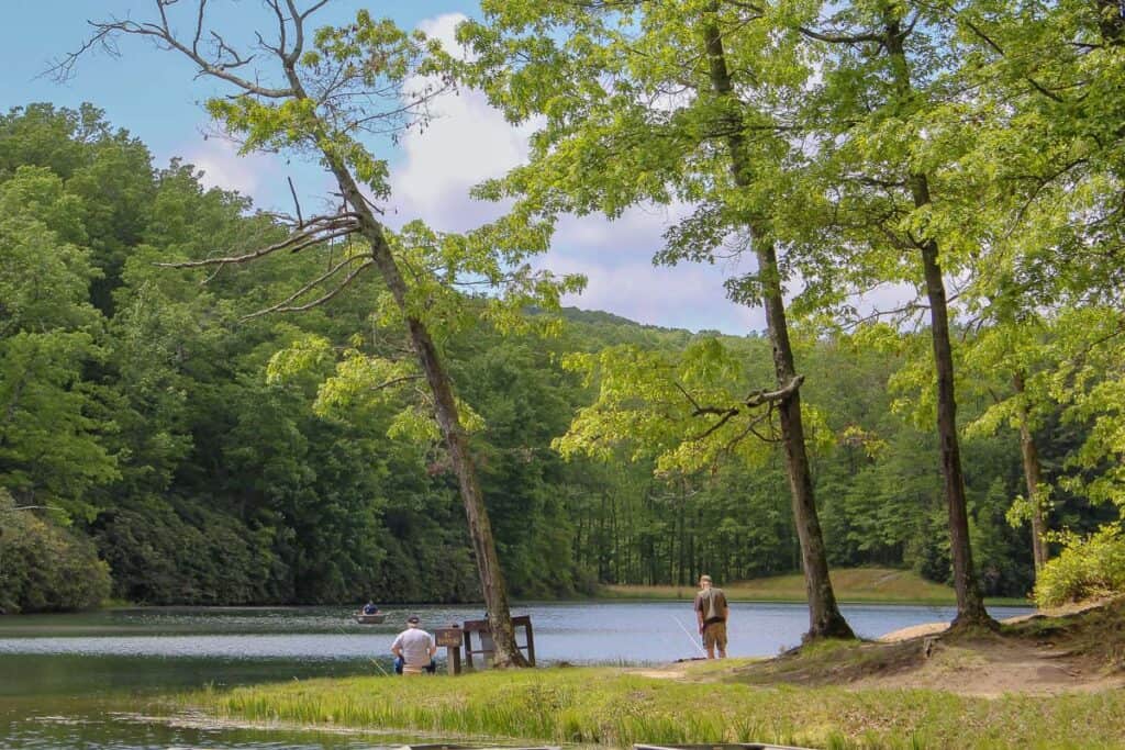 Boley Lake with fishermen on bank.