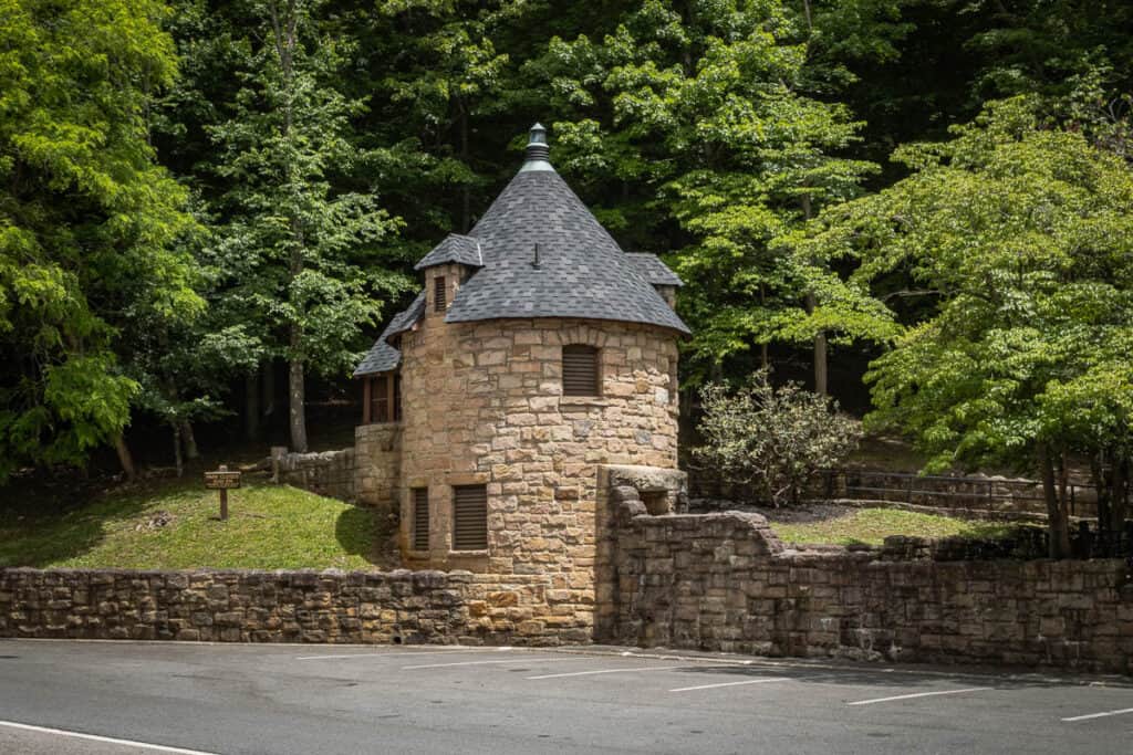 CCC-style stone building with restrooms.