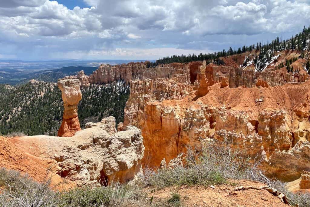 View of reddish brown craggy hillside viewed from Bryce Canyon scenic drive.