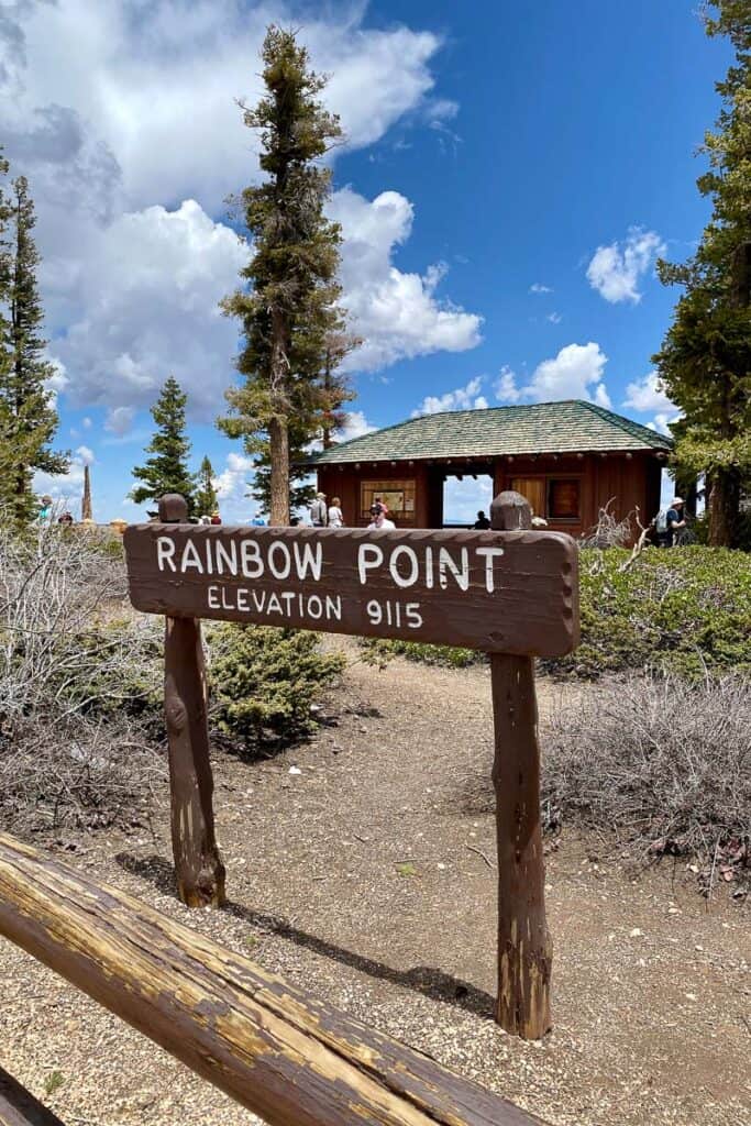 Sign that says "Rainbow Point, elevation 9115".