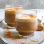 honey cinnamon lattes in clear mugs.