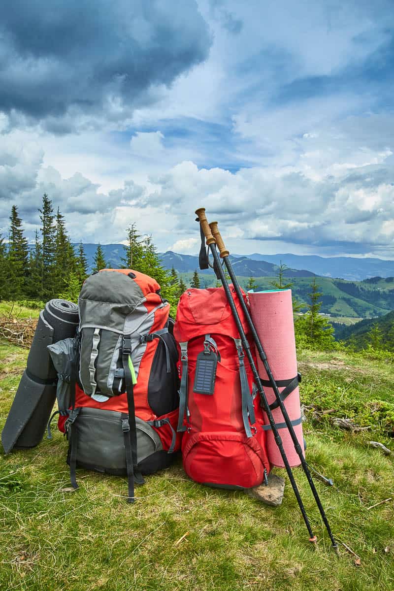 Backpacks and trekking poles that can be used when figuring out how to pack for backpacking when flying.
