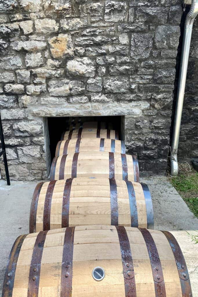 Row of bourbon barrels.