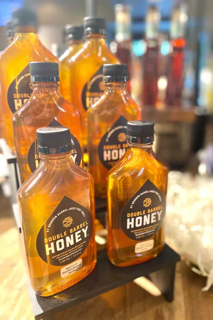 Bottles of bourbon barrel aged honey.
