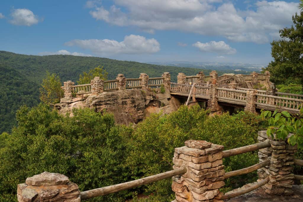 Series of walkways and wooden rails at overlook at Coopers Rock State Forest.