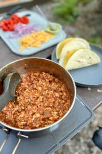 Heated taco meat mixture ready to spoon into tortillas.